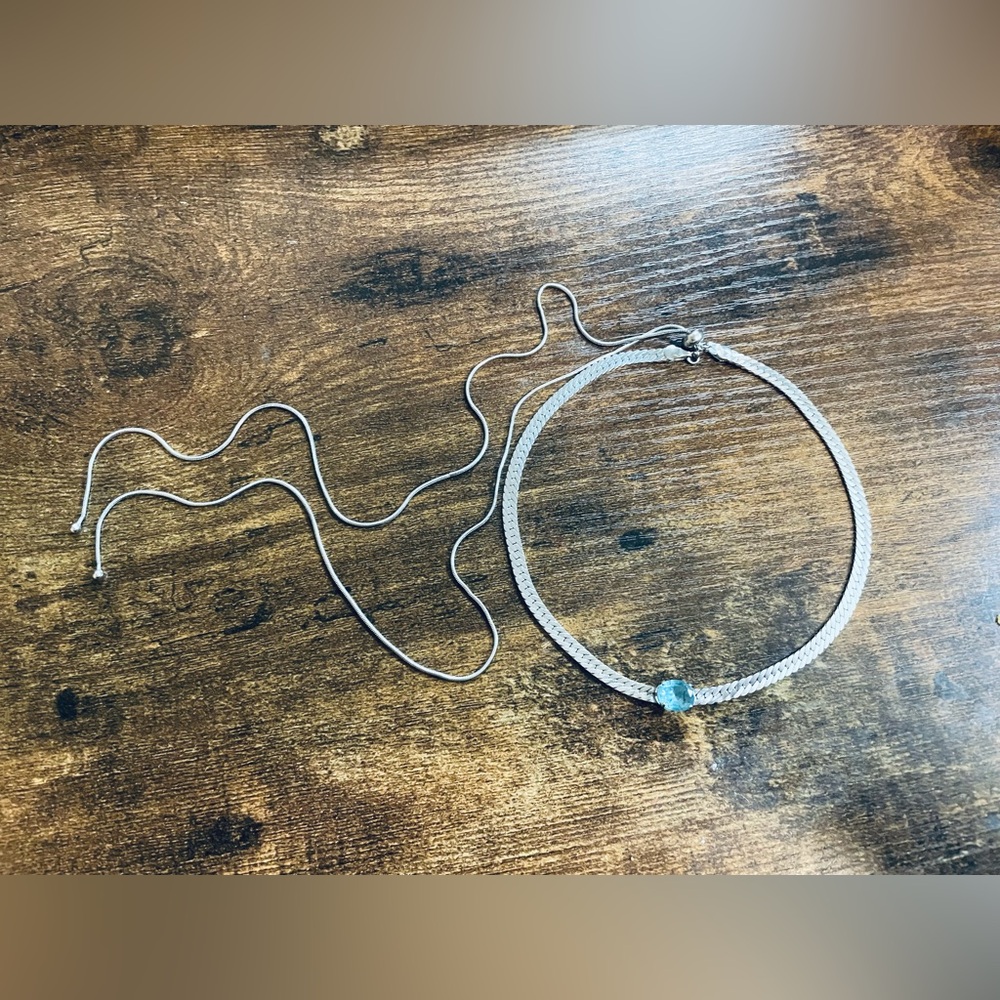 Silver Choker Necklace with Blue Stone and Backdrop